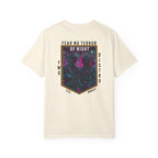 Ivory t-shirt with a neon-colored graphic featuring a framed image of two soldiers in tactical gear with rifles and night vision goggles, with text "FEAR NO TERROR OF NIGHT" at the top of the design, giving the art a futuristic, synthwave aesthetic.