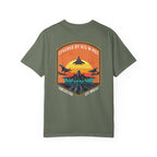 Moss t-shirt with graphic of fighter jets and sunset text Covered By His Wings on back