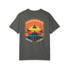 Pepper t-shirt with graphic of fighter jets and sunset text Covered By His Wings on back